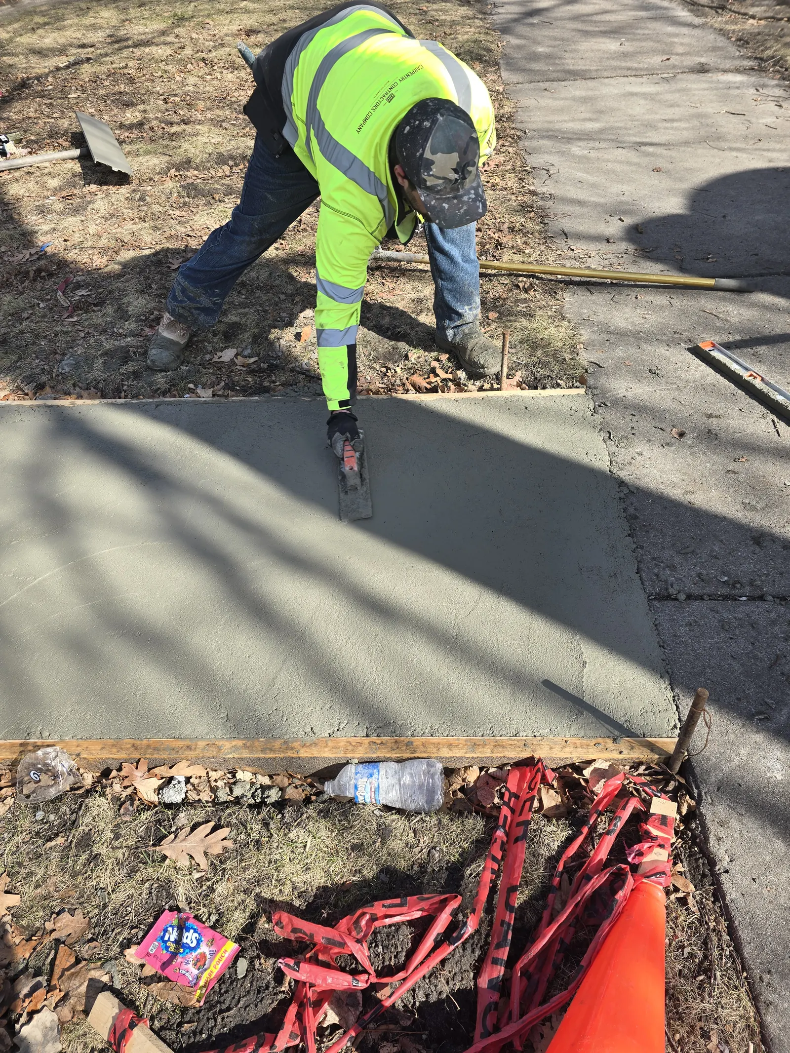 Alpha Concrete crew pouring and finishing fresh concrete